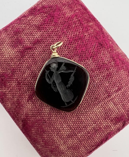 Antique 19th C Carved Carnelian Intaglio Pendant: Antique 19th C Carved Carnelian Intaglio Pendant. Gold filled frame. Having a Greco Roman Goddess intaglio in carnelian or colored glass. Measures 1.25 inches in length.