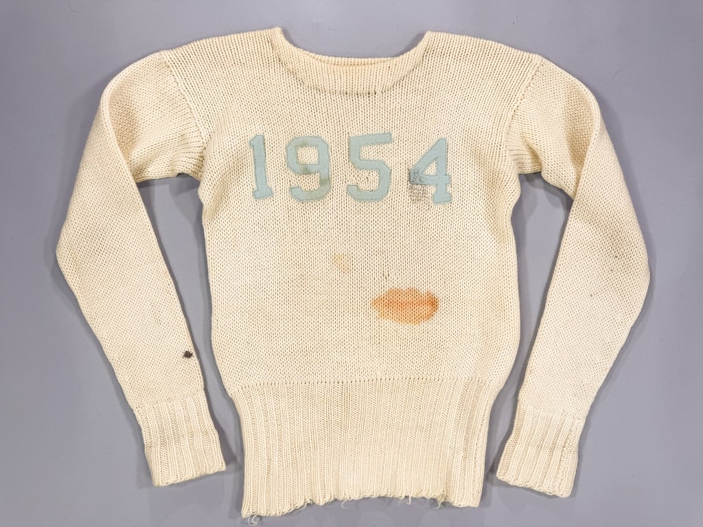 Vintage 1954 Ivory Wool Collegiate Knit Sweater: Vintage 1954 Ivory Wool Collegiate Knit Sweater having '1954' patches sewn on front, knit throughout with stretch. Labeled Welgrume Sportswear. Measuring 36-44 inch bust, 24 inches long, 24 inch sleev