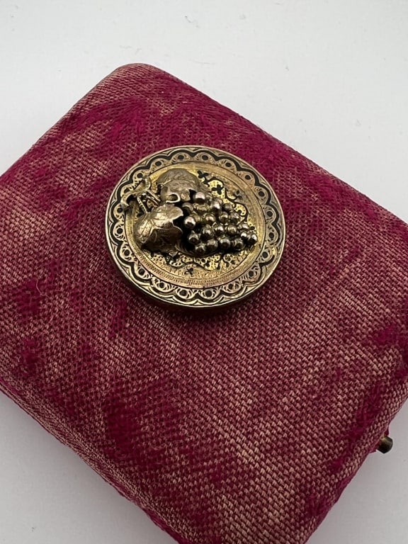 Antique 19th C Victorian Grape Pendant / Brooch: Antique 19th C Victorian Grape Pendant / Brooch. Yellow gold filled. Can be worn as a necklace pendant or a brooch. Measures just over 1 inch in diameter. Features a black enamel detailed frame.