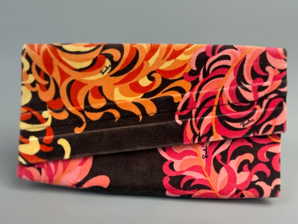Vintage Emilio Pucci Printed Velvet Clutch Bag: Vintage Emilio Pucci Printed Velvet Clutch Bag having snap closure and print throughout, fully lined. Measuring approximately 9 inches wide by 5 inches tall by 2 inches deep. General wear throughout a