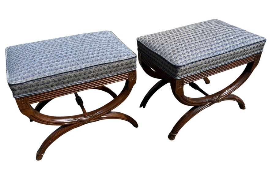Pair Savonarola Style Carved Base Ottoman Benches: Pair Savonarola Style Carved Base Ottoman Benches. Carved wood bases with upholstered seats. Each measures approximately 17 inches in height, 21 inches in width and 15 inches in depth.