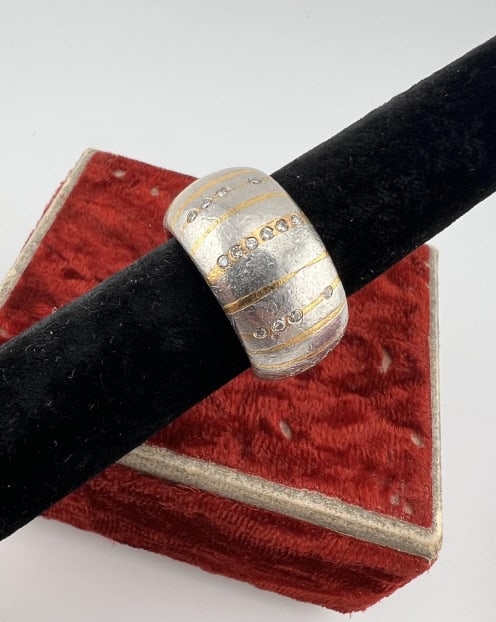 Designer Atelier Zobel Gold Silver Diamond Ring: Modern Designer Atelier Zobel Gold Silver Diamond Ring. Made by Michael Zobel / Atelier Zobel. This ring is made of sterling silver, with gold accents stripes and rows of white diamonds patterned thro