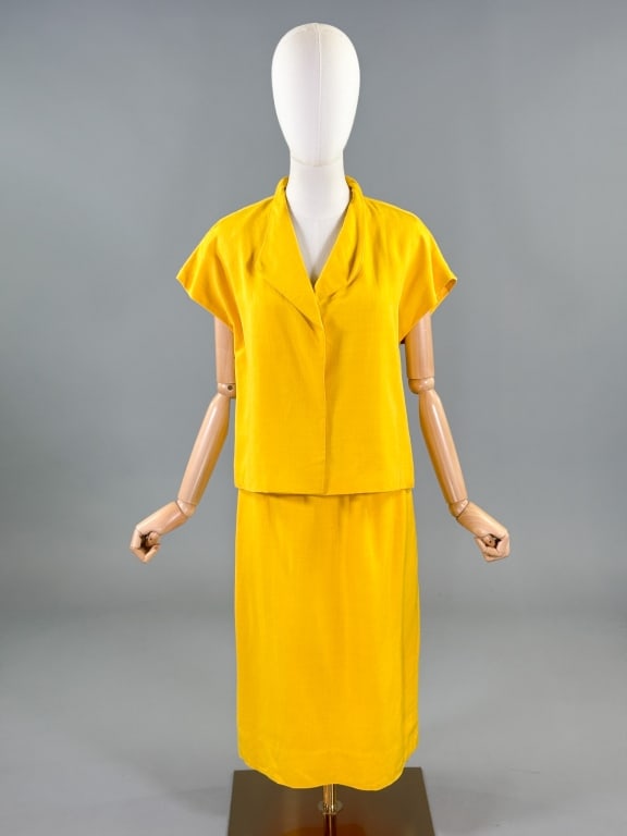 Vintage 1970s Halston Yellow Linen Skirt & Top Set: Vintage 1970s Halston Yellow Linen Two Piece Skirt & Top Set having top with shawl collar, snapping closed at front. Skirt with pockets zipping closed at side, both top and skirt fully lined. Top meas