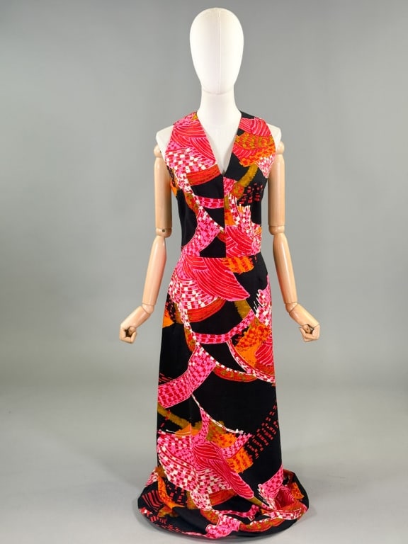 Vintage 1970s Printed Barkcloth Maxi Halter Dress: Vintage 1970s Printed Barkcloth Maxi Halter Dress having print throughout with center back zip closure and buttons at neck. Labeled Mister Robert - marked size 14. Measuring 38 inch bust, 30 inch wais