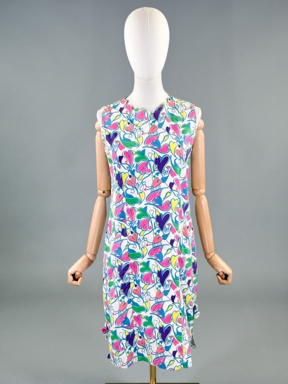 Vintage 1990s Lilly Pulitzer Heart Print Dress: Vintage 1990s Lilly Pulitzer Heart Print Dress having print throughout with two front patch pockets and center back zip closure. Labeled Lilly Pulitzer 36 inch bust, 26 inch waist, 38 inches long.