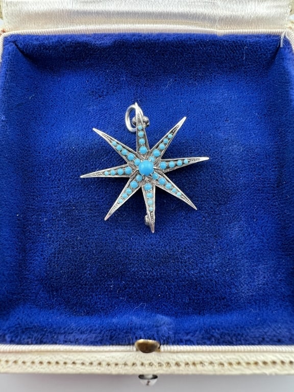 Antique Sterling & Turquoise Starburst Pendant: Antique Sterling & Turquoise Starburst Pendant. Late 19th century, Victorian. Sterling silver and cabochon turquoise necklace pendant. Measures 1.25 inches in length.