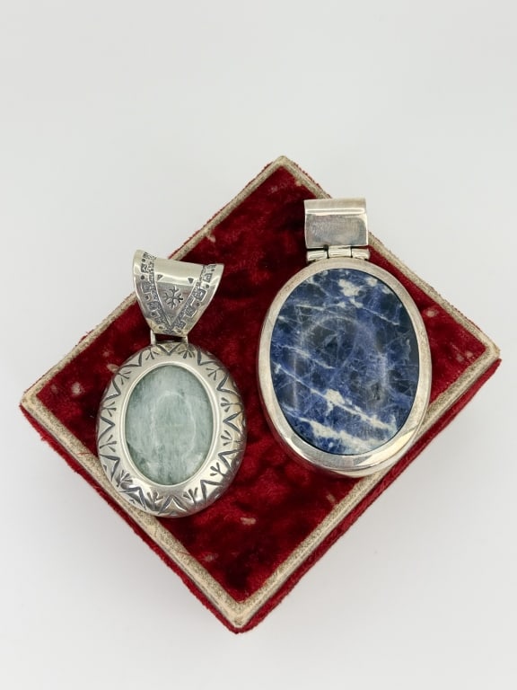 Two Sterling Silver Pendant - Sodalite & Quartz: Two Sterling Silver Pendant - Sodalite & Quartz. Both are hallmarked. Sodalite measures nearly 2.25 inches in length.