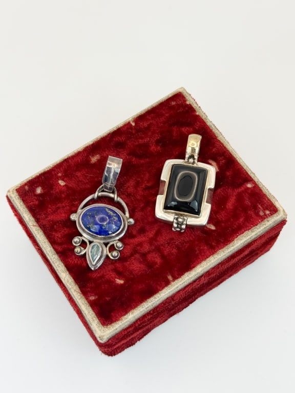Two Sterling Silver Pendant - Lapis & Black Onyx: Two Sterling Silver Pendant - Lapis Lazuli & Black Onyx. One is stamped 925 and one is signed Michael Dawkins. Lapis measures 1.5 inches in length.