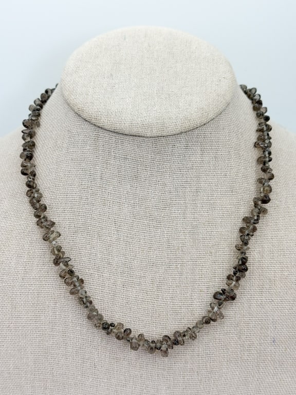 Sterling Silver & Smoky Quartz Beaded Necklace: Sterling Silver & Smoky Quartz Beaded Necklace. Heart form toggle clasp. Measures approximately 17 inches in length.