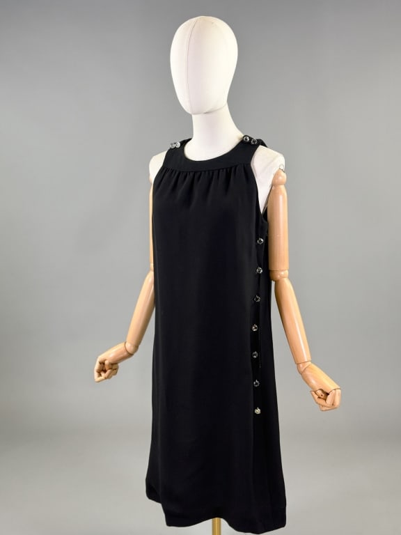 Vintage 1960s Teal Traina Wool Crepe Shift Dress: Vintage 1960s Teal Traina Wool Crepe Shift Dress having faceted glass button details throughout with side zip closure, fully lined. Labeled Teal Traina New York. Measuring 38 inch bust, 38 inch waist,