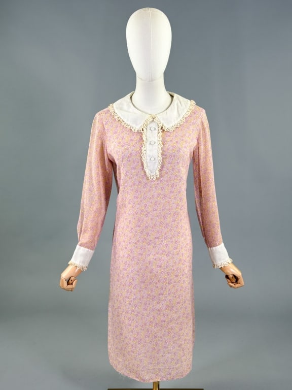 Vintage 1960s Floral Print Lace Trim A-Line Dress: Vintage 1960s Floral Print Lace Trim A-Line Shift Dress having lace detail at collar and cuffs, closing at center back with zip. Labeled Majestic. Measuring 36 inch bust, 34 inch waist, 38 inches long