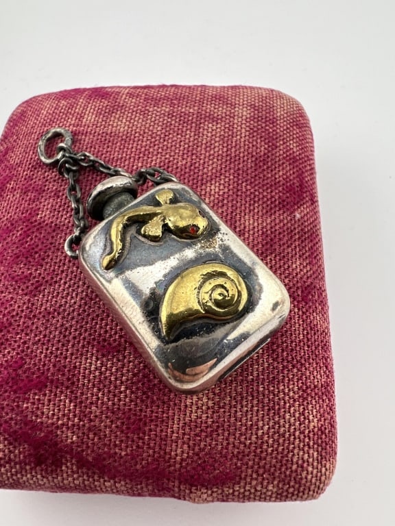Antique Silver Two Tone Bottle Form Pendant or Fob: Antique Silver Two Tone Bottle Form Pendant or Fob. With tadpole and sea shell design. Measures just over 2.25 inches in length.