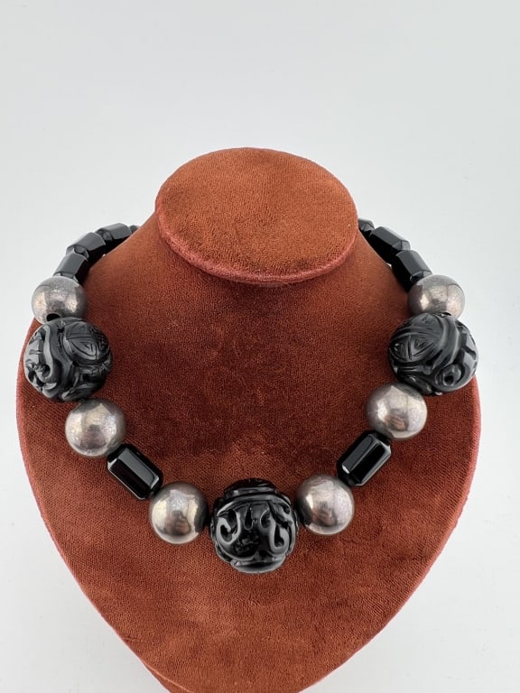 Vintage Chinoiserie Style Necklace w Sterling: Vintage Chinoiserie Style Necklace w Sterling Clasp. Having black onyx or onyx glass beads, carved Asian style beads and a sterling navette clasp. Measures 16 inches in length.