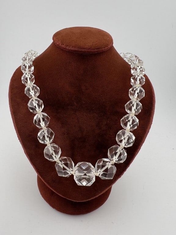 Antique Faceted Rock Crystal Bead Necklace Strand: Antique Faceted Rock Crystal Bead Necklace Strand. Hand knotted on while silk thread and set with a white gold filled clasp. Largest bead measures approximately .75 of an inch and necklace overall mea
