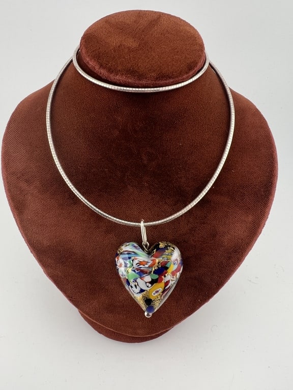 Italian Murano Art Glass Real Gold Heart Pendant: Italian Murano Art Glass Real Gold Leaf in Heart Pendant. On sterling silver over bronze necklace chain, tag at clasp is marked. Chain measures just over 18 inches in length.