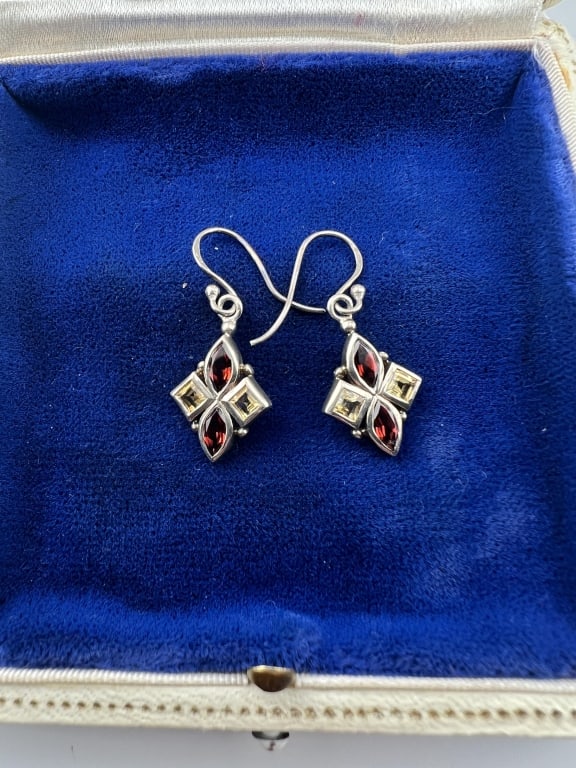 Sterling Silver Citrine & Topaz Pair of Earrings: Sterling Silver Citrine & Topaz Pair of Earrings. Stones test as citrine and topaz on the Presidium. Each measures 1.25 inches in length and are hallmarked on the back.