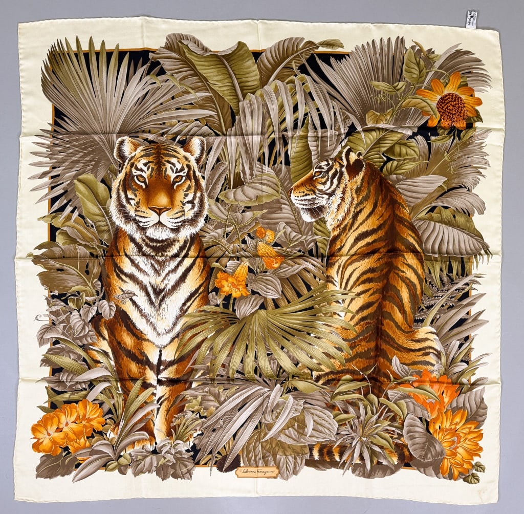 Vintage Salvatore Ferragamo Tiger Silk Scarf: Vintage Salvatore Ferragamo Tiger Jungle Silk Scarf with hand rolled edges, signed Salvatore Ferragamo. Labeled Made in Italy - 100% Silk. Measuring approximately 34 inches by 34 inches.