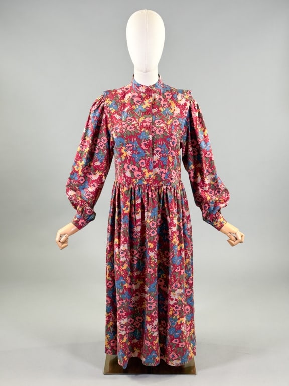 Vintage 1990s Laura Ashley Cotton Floral Dress: Vintage 1990s Laura Ashley Cotton Floral Dress having button front closure with long sleeves, pockets at side, and ruched waistline. Labeled Laura Ashley - marked size US 8. Measuring 34 inch bust, 32