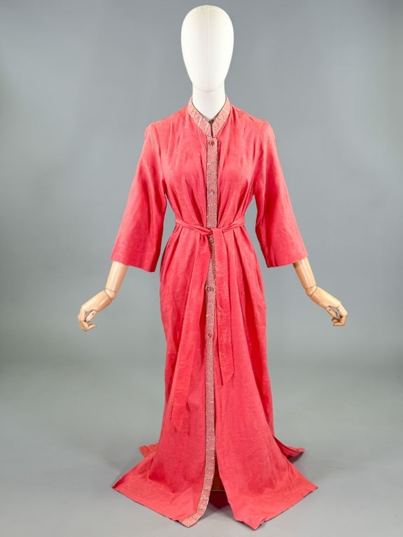 Vintage 1960s Julius Lonschein Floral Lounge Dress: Vintage 1960s Julius Lonschein Floral Lounge Dress having lame trim detail with Mandarin collar and button front closure. Labeled Julius Lonschein. Measuring 38 inch bust, 40 inch waist, 52 inches lon
