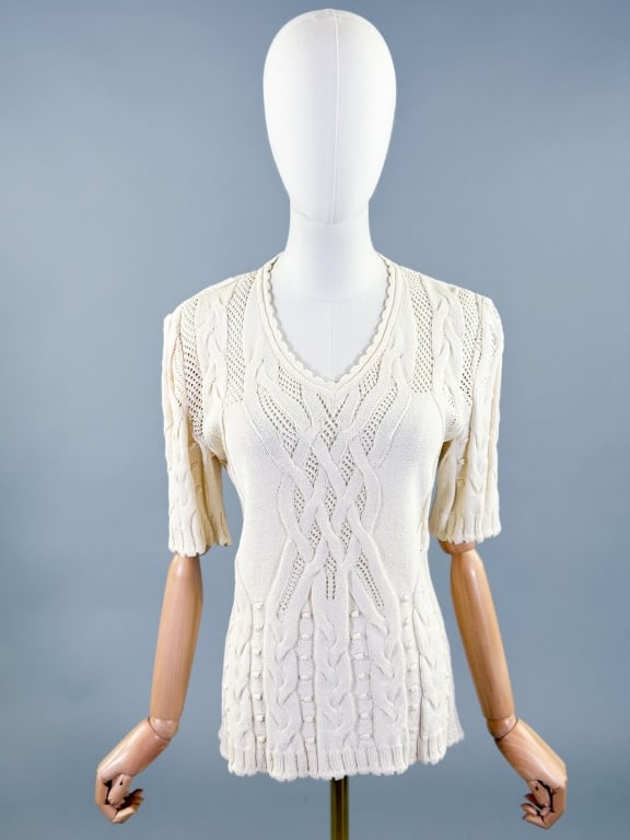 Vintage St. John Collection Cable Knit Sweater Top: Vintage St. John Collection Cable Knit Sweater Top having v-neckline with cable knit design throughout. Labeled St. John Collection by Marie Gray - marked size 4. Measuring 34 - 44 inch bust, 28 - 42 
