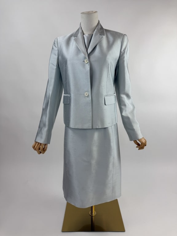 Vintage Michael Kors Blue Silk 2 Piece Dress Set: Vintage Michael Kors Blue Silk 2 Piece Dress & Jacket Set. Button front jacket with notched lapel and two front flap pockets. Dress zips up back to close and is sleeveless & fitted throughout. Light