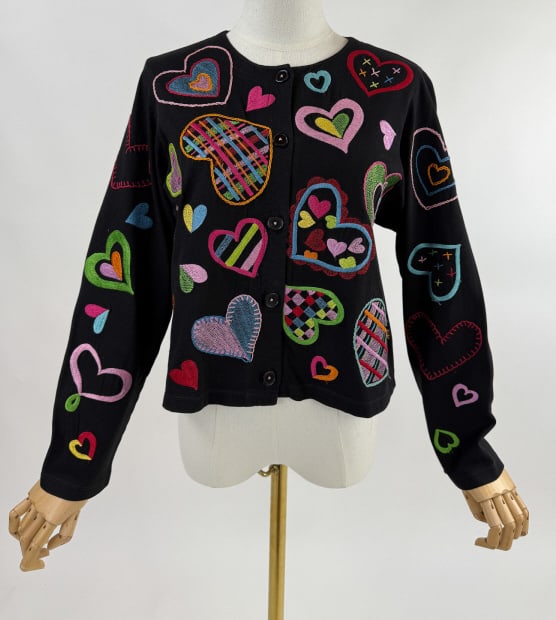 Vintage Michael Simon Heart Cardigan Sweater: Vintage Michael Simon Embroidered Heart Cardigan Sweater. Buttons up front to close. Stretch throughout. Measures 21 inch chest laid flat, 20 inches long, 21 inch sleeve length.