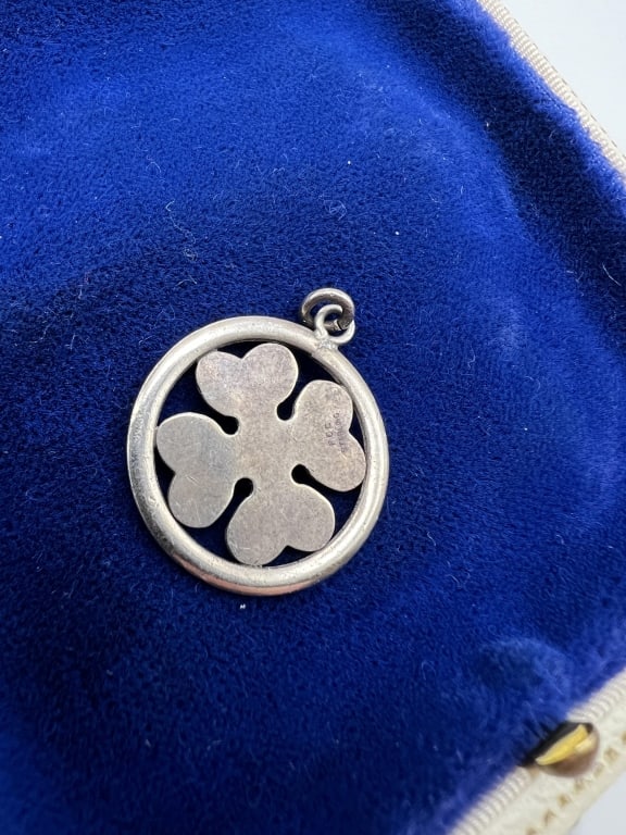 Vintage Sterling Silver Four Leaf Clover Pendant: Vintage Sterling Silver Four Leaf Clover Pendant. Necklace pendant or charm. Hallmarked. Measures 1 inch in length.