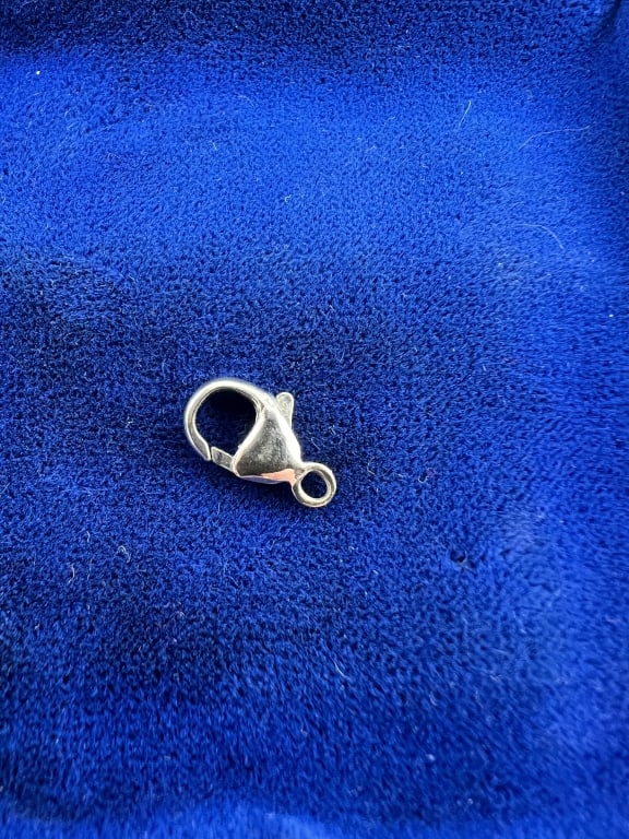 Estate Vintage 14kt White Gold Lobster Clasp: Estate / Vintage 14kt White Gold Lobster Clasp. Hallmarked 585 for 14kt gold. Measures 1/2 an inch in length.
