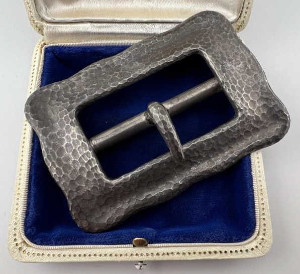 Tiffany & Co Antique Sterling Silver Buckle: Tiffany & Co Antique Sterling Silver Buckle. Having a hammered texture finish. Signed TIFFANY & CO and STERLING on the back. Measures 2.25 x 3.25 inches. Weighs approximately 70 grams total weight.