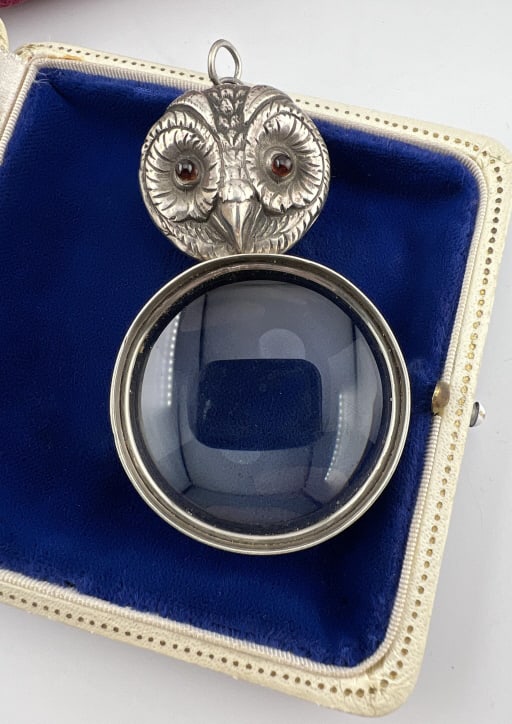 Estate Sterling Silver Owl Motif Magnifier Pendant: Estate Sterling Silver Owl Motif Magnifier Pendant Necklace pendant or chatelaine with bail for chain or clip. Hallmarked on back. Featuring a well detailed owl face with cabochon eyes. Measures 3 inc