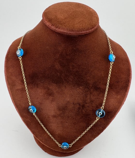 Gold Over Silver Evil Eye Charm Necklace: Gold Over Silver Evil Eye Charm Necklace Yellow gold plated over sterling silver, clasp is hallmarked 925. Chain measures 18 inches in length and is set with five art glass evil eye charms.