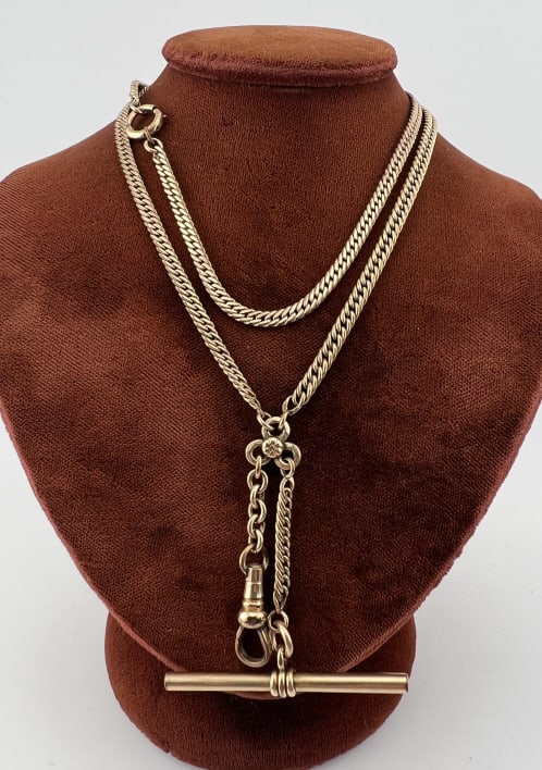 Antique Gold Fill Watch Chain Necklace: Antique Gold Fill Watch Chain Necklace Yellow gold filled curb link necklace chain, having two extenders one with a t-bar and one with a dog clip. Chain itself measures approximately 21 inches in