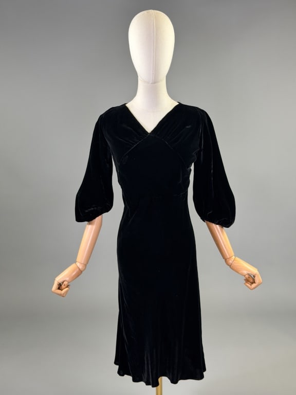 Vintage 1930s Silk Velvet Bias Cut Dress: Vintage 1930s Silk Velvet Bias Cut Dress having v-neckline with ruched bust and puffed sleeves, bias cut with no closures. Measuring 32 - 38 inch bust, 24 - 36 inch waist, 42 inches long, 18 inch slee