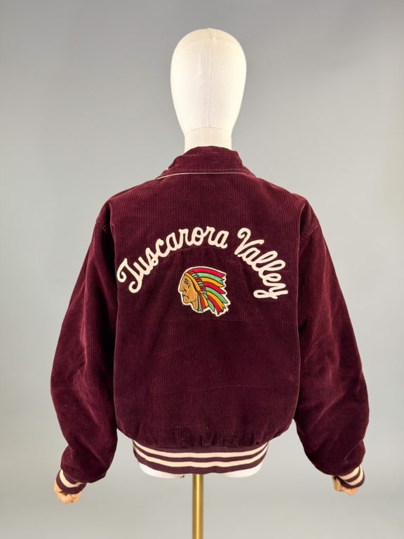 Vintage 1960s Corduroy Chief Head Varsity Jacket: Vintage 1960s Corduroy Native Chief Head Varsity Jacket having snap front closure with striped rib knit hem and cuffs and quilted lining. Labeled Maple Athletic Sportswear - marked size 42. Measuring 
