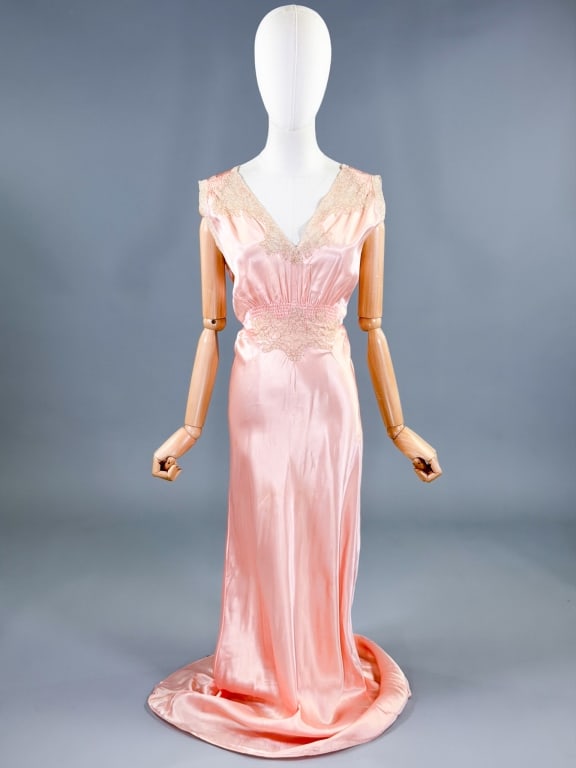 Vintage 1940s Satin Lace Night Gown Slip Dress: Vintage 1940s Rayon Satin Lace Night Gown Slip Dress having ruching and lace details at bust, attached ties at waist, bias cut throughout with stretch, no closures. Measuring 38 - 42 inch bust, 32 - 3