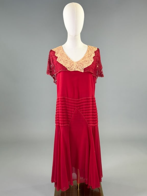 Antique 1920s Silk Lace Drop Waist Flapper Dress: Antique 1920s Silk Lace Drop Waist Flapper Dress having lace cape detail at shoulders with horizontal stripes at waist with fluttered skirt, fully lined. Measuring 38 inch bust, 38 inch waist, 45 inch