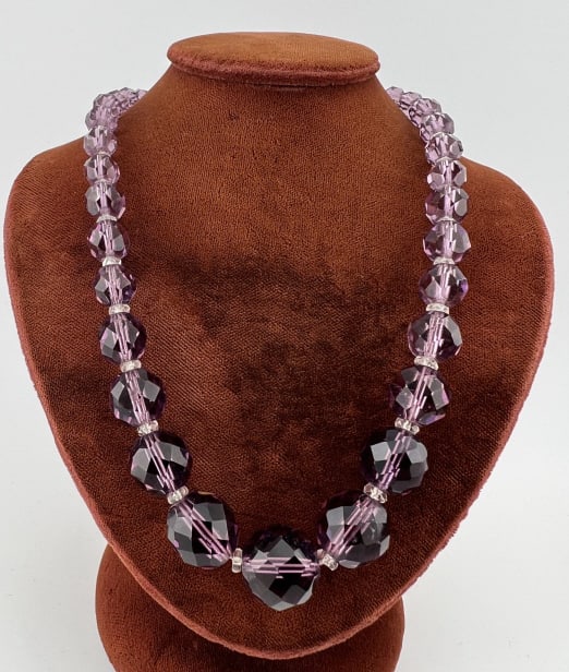 Antique Amethyst Glass & Crystal Bead Necklace: Antique Amethyst Glass & Crystal Bead Necklace. Graduated size beads. Measures approximately 17 inches in length.