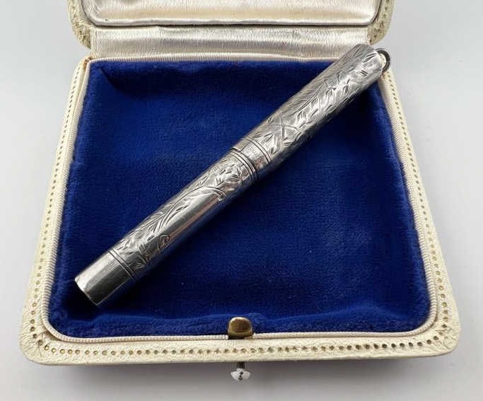 Antique Sterling Silver Chatelaine Pendant Pen: Antique Sterling Silver Chatelaine Pendant Pen by Ideal. Bail for chain at top. Hallmarked. Measures 4 inches in with the bail.