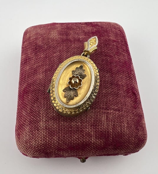 Antique 19th C Combo Gold & Gold Filled Locket: Antique 19th C Combination Gold & Gold Filled Locket Necklace Pendant. Gold filled locket with gold overlay accent oval halo. Measures 1.75 inches in length.