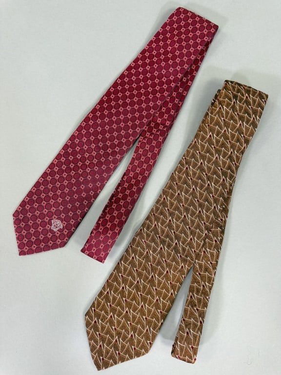 Two Vintage Versace & Ferragamo Men's Neck Ties: Two Vintage Versace & Ferragamo Men's Neck Ties, one Versace and one Salvatore Ferragamo, both 100% silk. Longer measuring approximately 62 inches long.