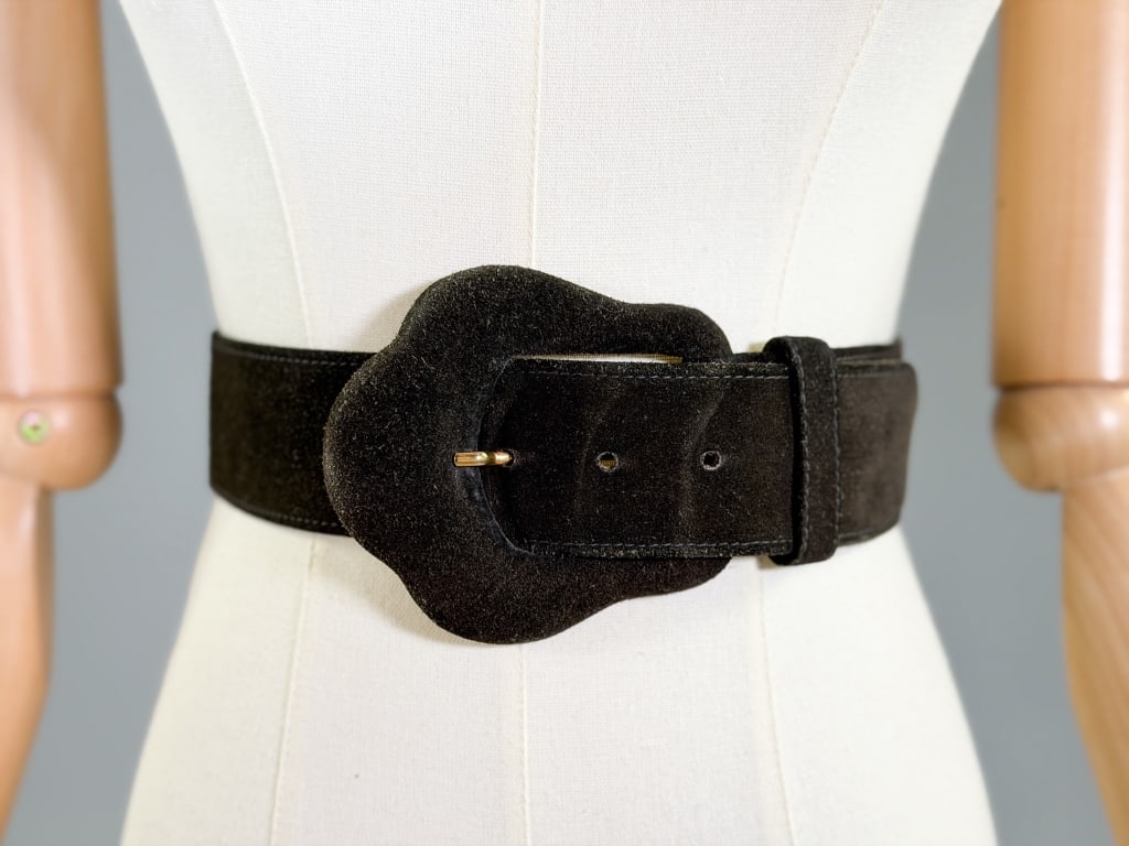 Vintage 1980s Yves Saint Laurent Leather Belt: Vintage 1980s Yves Saint Laurent Suede Leather Belt having buckle closure, labeled Yves Saint Laurent Genuine Leather - marked size M. Measuring 31, 32, 33 inch waist respectively, 38 inch total lengt