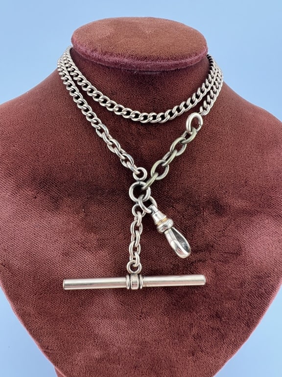 Antique 19th C Gold Filled Watch Chain Necklace: Antique 19th C Gold Filled Watch Chain Necklace. Having a dog clip for pendants / charm or pocket watch as well as a T bar. Curb link chain. Measures 17 inches in length. Spring ring clasp.