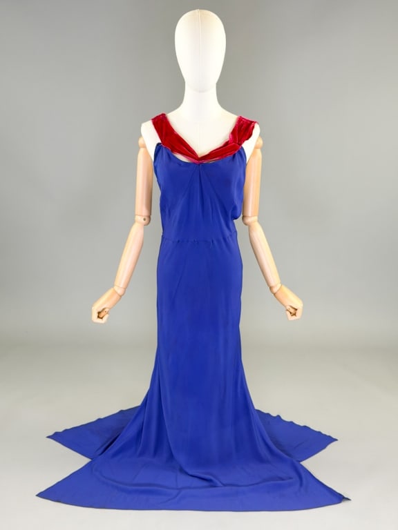 Vintage 1930s Crepe Velvet Bias Cut Evening Gown: Vintage 1930s Crepe Velvet Bias Cut Evening Gown having velvet detail at shoulders with bias cut throughout, closing at back with buttons. Measuring 32-40 inch bust, 26-36 inch waist, 60 inches long. 