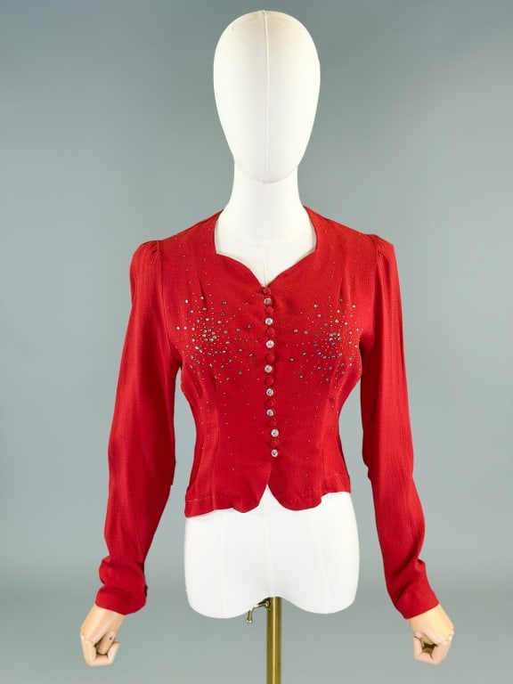 Vintage 1930s Crepe Rhinestone Studded Jacket Top: Vintage 1930s Crepe Rhinestone Studded Jacket Top having button front closure with prong set and metal stud details at front, marked size 16. Measuring 36-38 inch bust, 26-28 inch waist, 18 inches lon