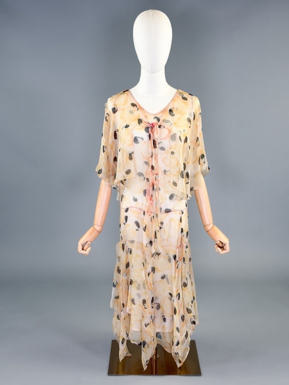 Vintage 1930s Printed Silk Chiffon Caped Dress: Vintage 1930s Printed Silk Chiffon Caped Dress having cape and tie at neck with fluttered skirt, no closures slides over head. Measuring 36 inch bust, 30 inch waist, 46 inches long, 12 inch long cape 