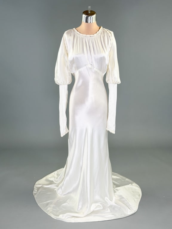 Vintage 1930s Candlelight Satin Wedding Gown Dress: Vintage 1930s Candlelight Satin Wedding Gown Dress having Juliet sleeves with bias cut, back neck hook, no other closures slides over head. Measuring 32-36 inch bust, 24-32 inch waist, 58 inch front l