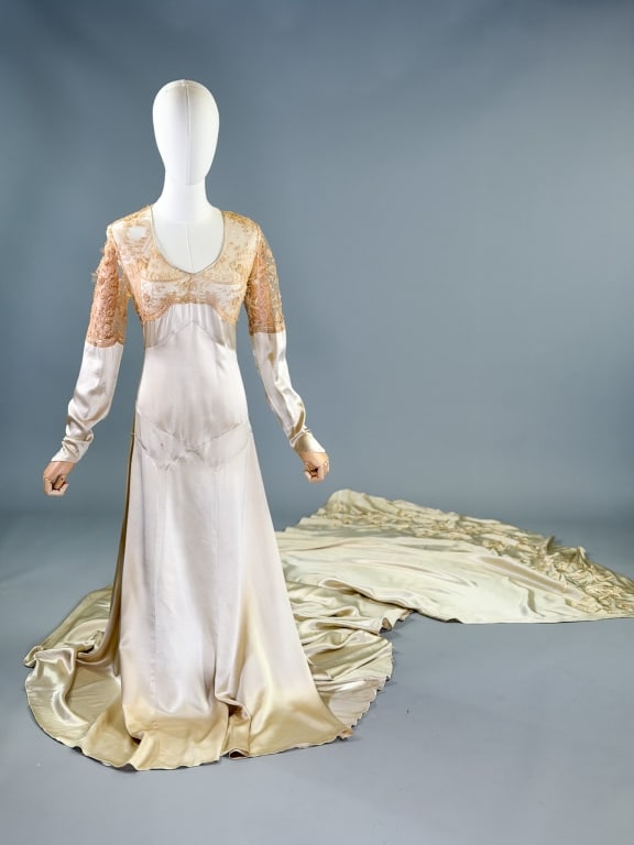 Vintage 1930s Silk Satin Lace Wedding Gown Dress: Vintage 1930s Silk Satin Lace Wedding Gown Dress having lace detail at bust and sleeves, bias cut with Deco seaming, side hook closure, and dramatic embroidered court train. Measuring 34-38 inch bust,