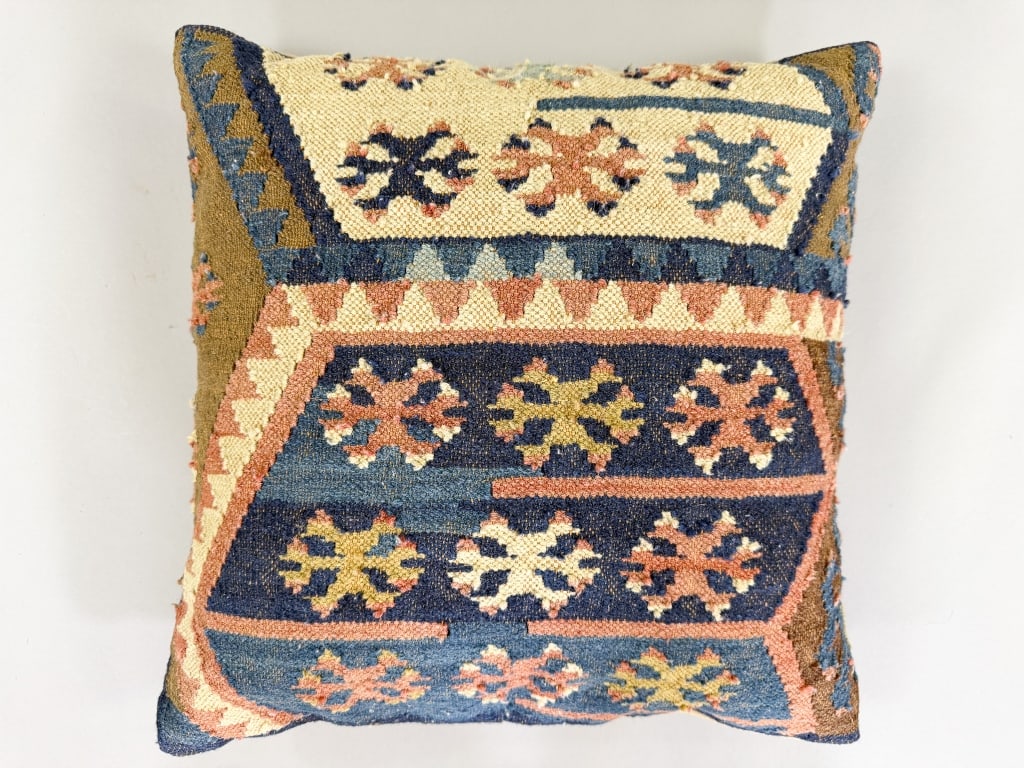 Vintage Wool Kilim Woven Decorative Throw Pillow: Vintage Wool Kilim Woven Decorative Throw Pillow having down filling measuring approximately 19 inches by 19 inches.