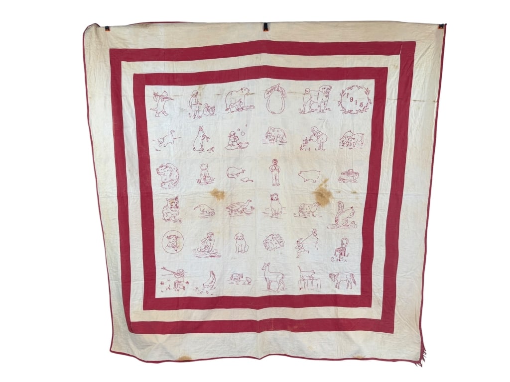 Antique Dated 1915 Redwork Embroidered Quilt: Antique Dated 1915 Redwork Embroidered Quilt having embroidery throughout, general wear holes and spots as shown. Measuring approximately 74 inches by 72 inches.