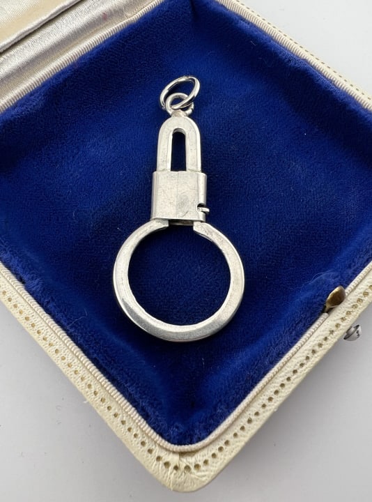 Vintage Mexico Sterling Charm Holder Pendant: Vintage Mexico Sterling Silver Key Chain or Charm Holder Pendant. Hallmarked on the back. Measures 2.5 inches in length.